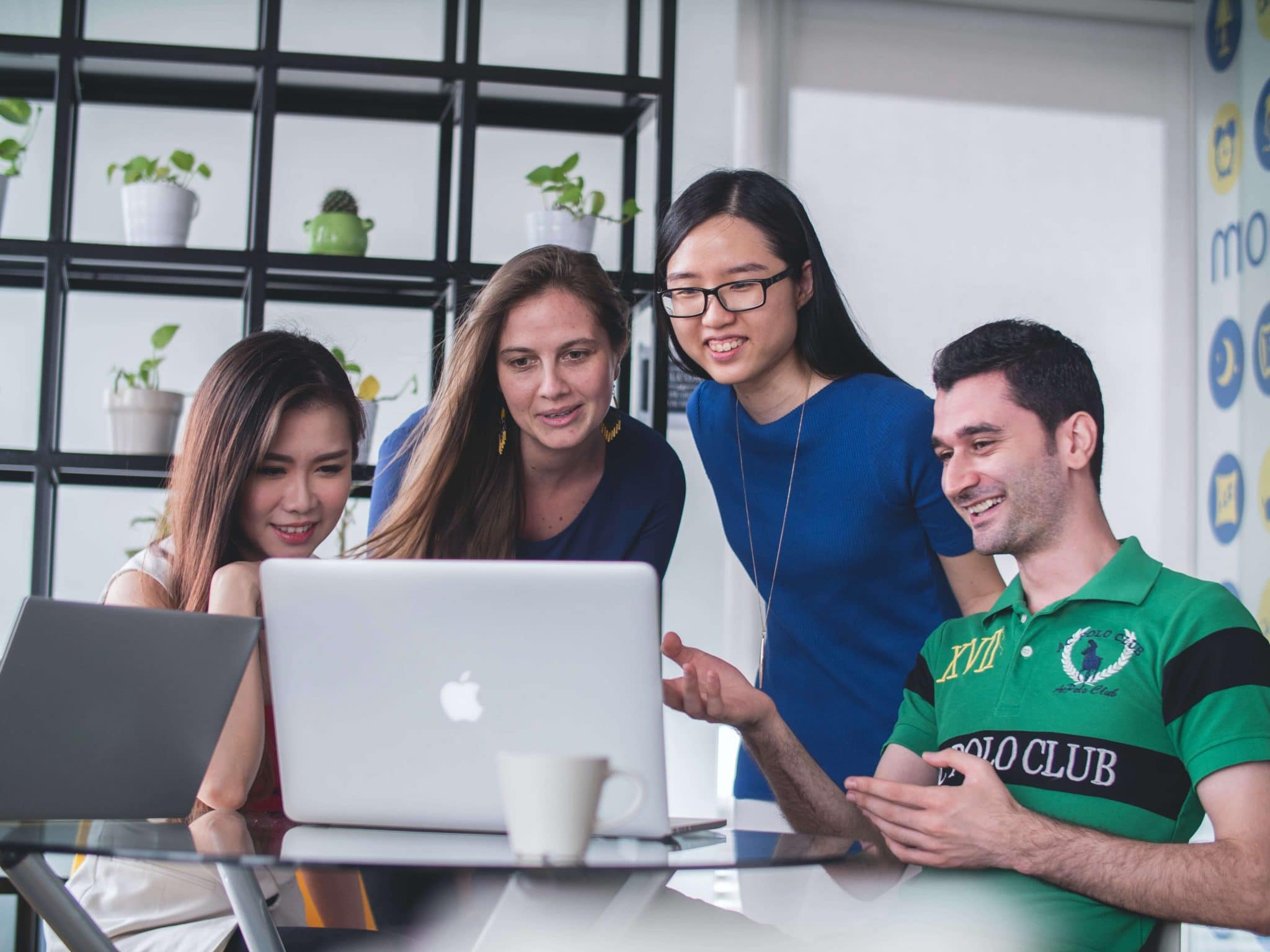 Students working in a group on computers