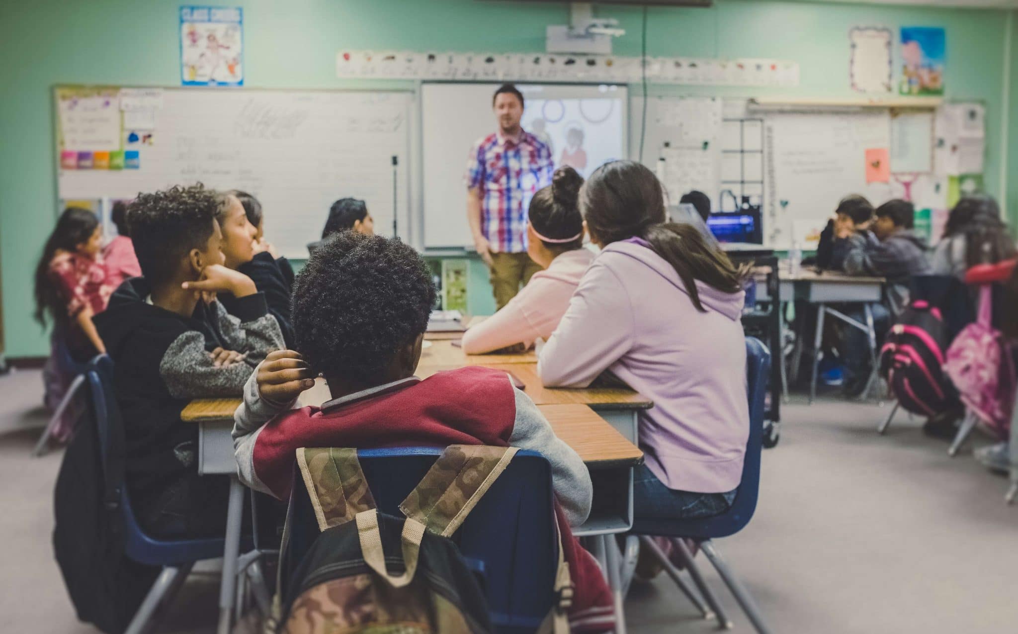 Teacher in front of a classroom