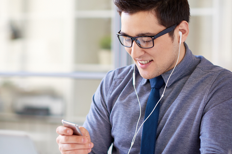 a male college student learning his lessons the auditory medium