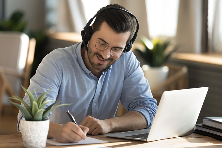 a male academic writer working on his assignment