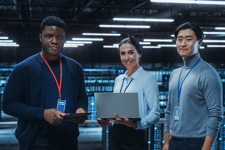 three cybersecurity professionals working on a group project