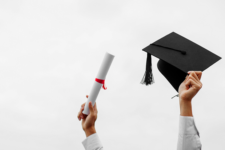 a master's degree student celebrating the graduation day