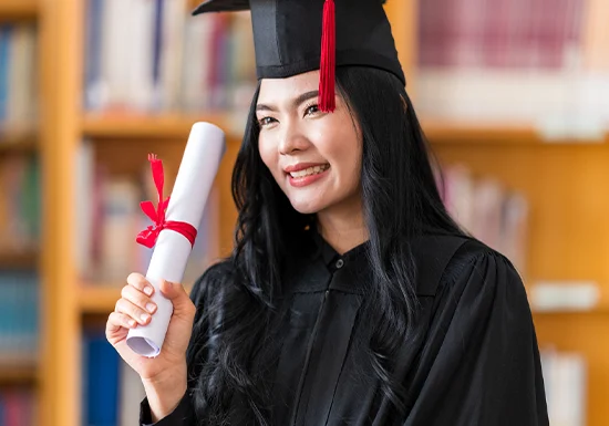 a female graduate celebrating her graduation day