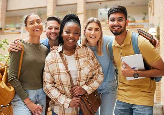 American community college students posing together for a picture