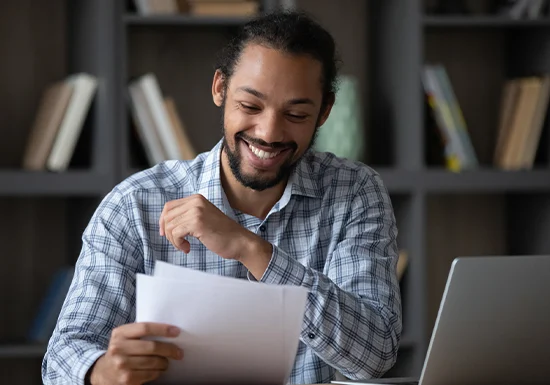 a male college student feeling happy at being accepted into an American college of choice